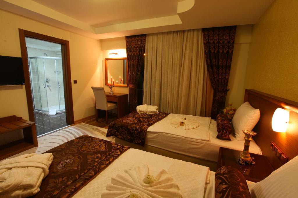 Saadet Grand Hotel Гатай Номер фото